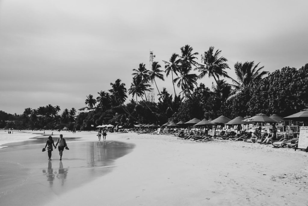 Couple walking Mirissa Beach - Sri Lanka